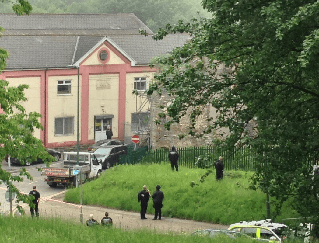 Armed police at the scene (Twitter)