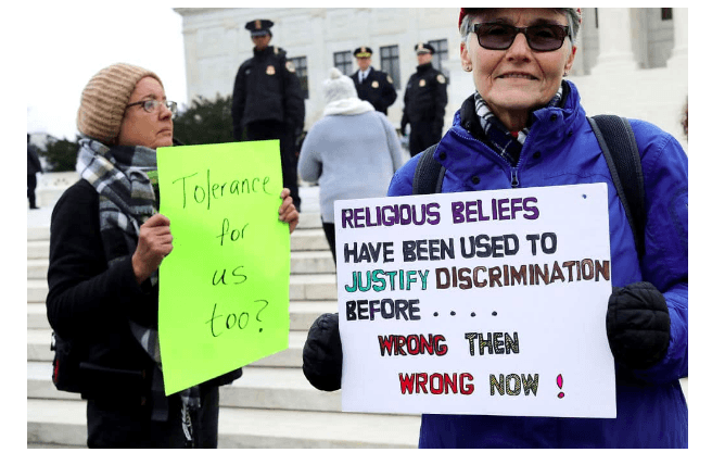Protesters on both sides of the issue rally in front of the Supreme Court building on the day the court is to hear the case Masterpiece Cakeshop v. Colorado Civil Rights Commission December 5, 2017 in Washington, DC. (Getty Images)