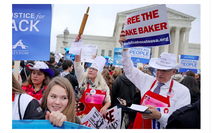 Demonstrators rally in front of the Supreme Court building on the day the court is to hear the case Masterpiece Cakeshop v. Colorado Civil Rights Commission December 5, 2017 in Washington, DC. (Getty Images)