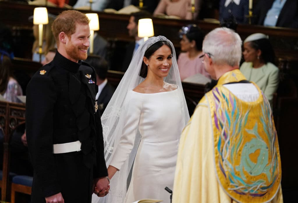Prince Harry and Meghan Markle during their wedding service, conducted by the Archbishop of Canterbury Justin Welby in St George's Chapel at Windsor Castle on May 19, 2018 in Windsor, England. (Photo by Dominic Lipinski - WPA Pool/Getty Images)
