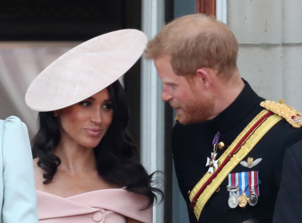 Meghan, Duchess of Sussex and Prince Harry, Duke of Sussex on the balcony of Buckingham Palace during Trooping The Colour on June 9, 2018 in London, England. (Photo by Chris Jackson/Getty Images)
