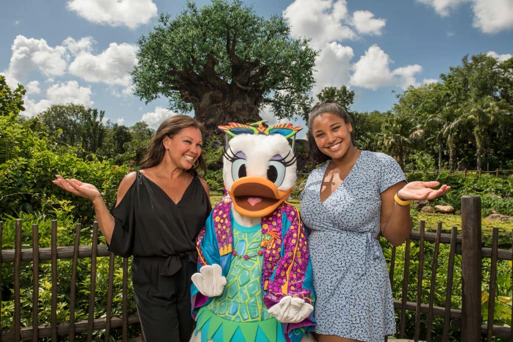 In this handout images provided by Walt Disney World Resort, Actress, singer and fashion designer Vanessa Williams poses with Daisy Duck, donning her fashionable Donald's Dino-Bash! outfit, at Disney's Animal Kingdom on June 12, 2018 in Lake Buena Vista, Florida. (Kent Phillips/Walt Disney World Resort via Getty Images)