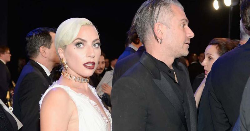 Lady Gaga and fiance Christian Carino show plenty of PDA on their romantic dinner date