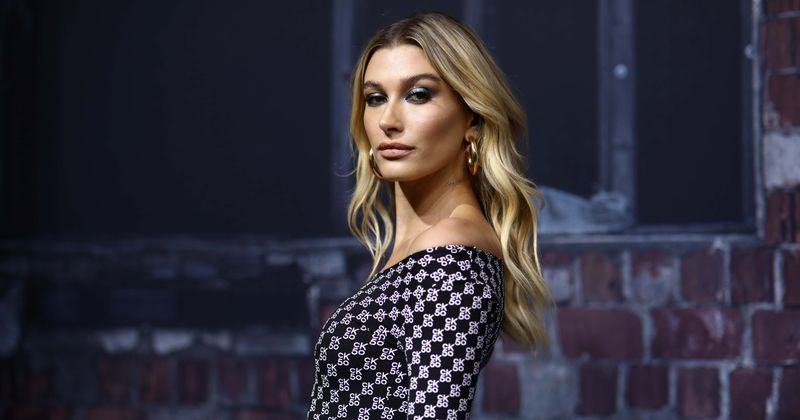 Hailey Baldwin flashes what looks like an engagement ring after reuniting with Justin Bieber