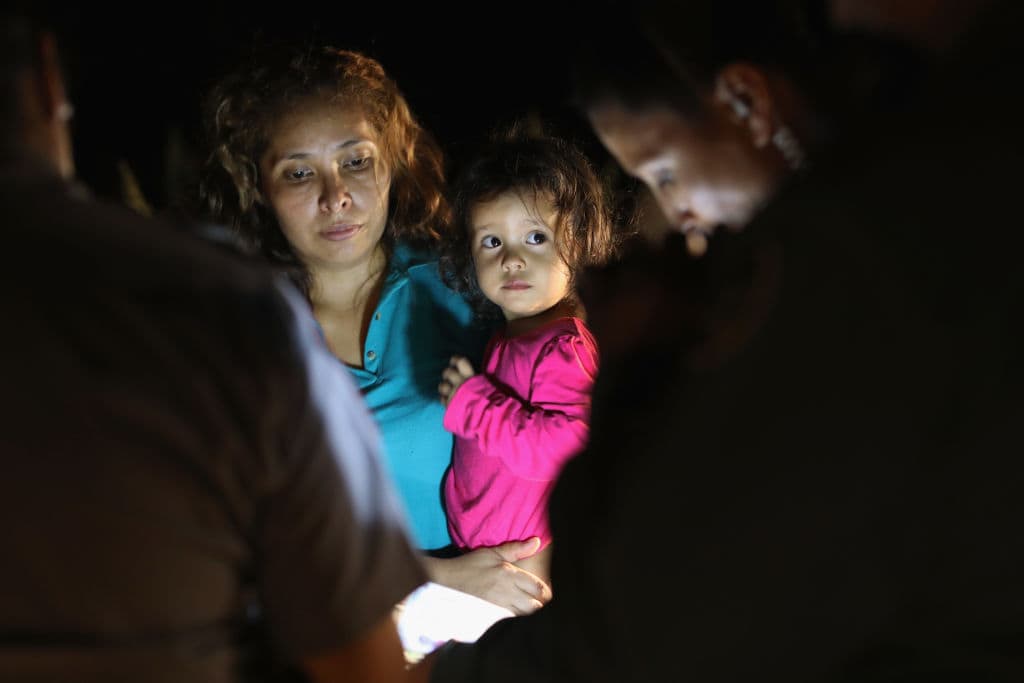 Central American asylum seekers, including a Honduran girl, 2, and her mother, are taken into custody near the U.S.-Mexico border on June 12, 2018, in McAllen, Texas. (Photo by John Moore/Getty Images)