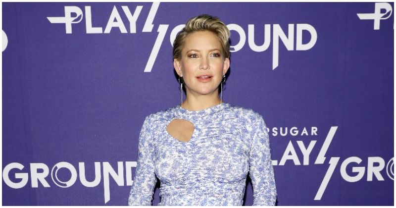 Kate Hudson shows off her growing baby bump in a vibrant yellow bikini