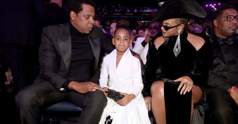 Blue Ivy cringes with embarrassment watching Beyonce and Jay-Z's sexy video at concert