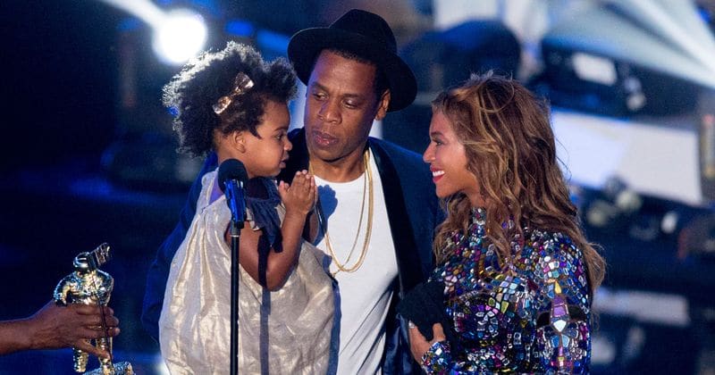Blue Ivy cringes with embarrassment watching Beyonce and Jay-Z's sexy video at concert
