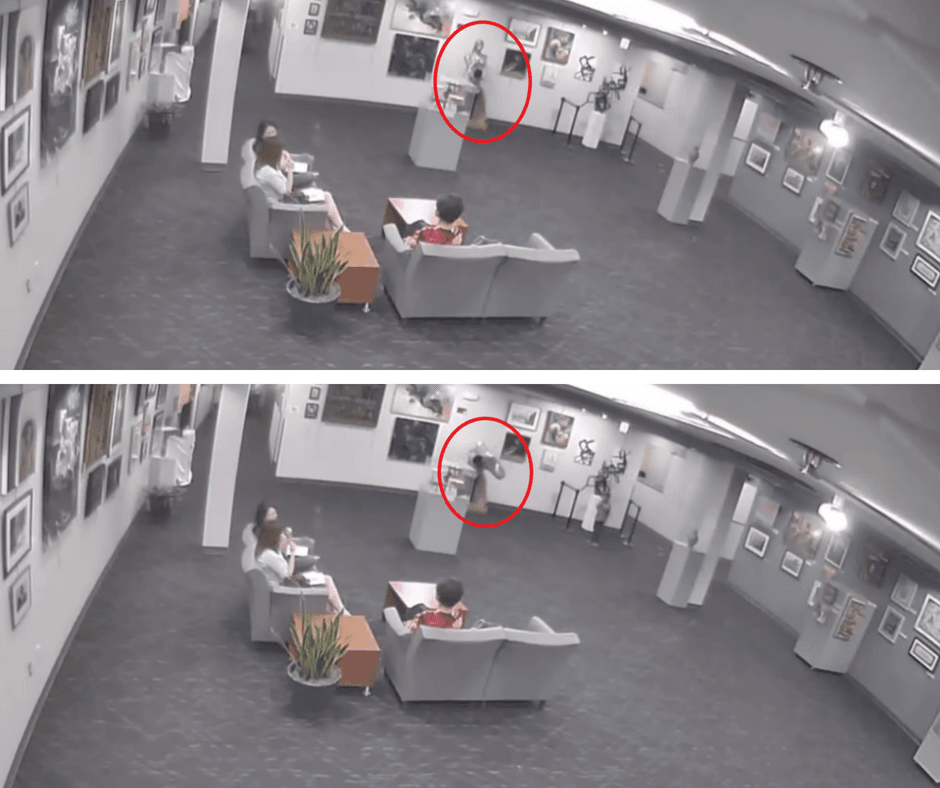 The moment the toddler toppled the statue was caught on CCTV (YouTube)