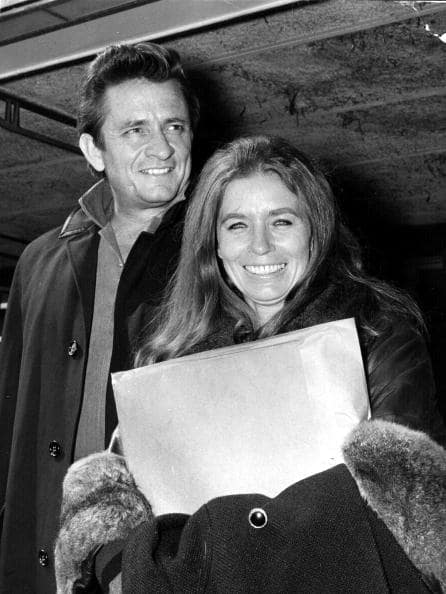Johnny Cash and his wife June Carter Cash of the Carter Family group pictured in 1968 at London Airport in London (Getty Images)