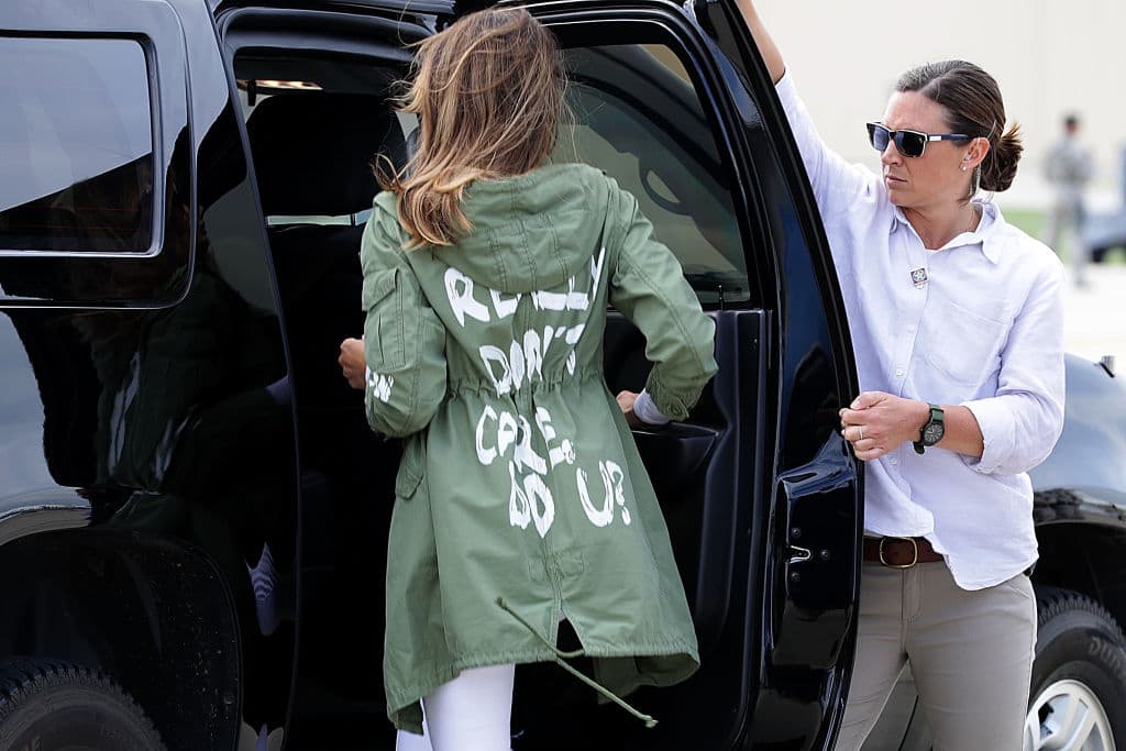 Melania Trump (C) climbs back into her motorcade after traveling to Texas to visit facilities that house and care for children taken from their parents at the U.S.-Mexico border June 21, 2018, at Joint Base Andrews, Maryland.(Photo by Chip Somodevilla/Getty Images)