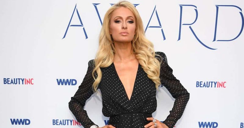 Paris Hilton continues to taunt Lindsay Lohan by commenting on an old video of her trying to swat away the paparazzi
