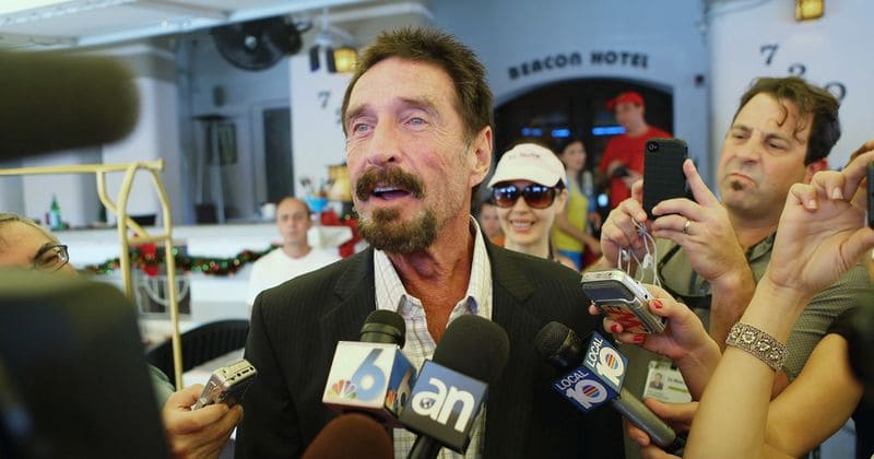 John McAfee says it would take more than "poison, bullets, or hanging to kill me" after being released from hospital