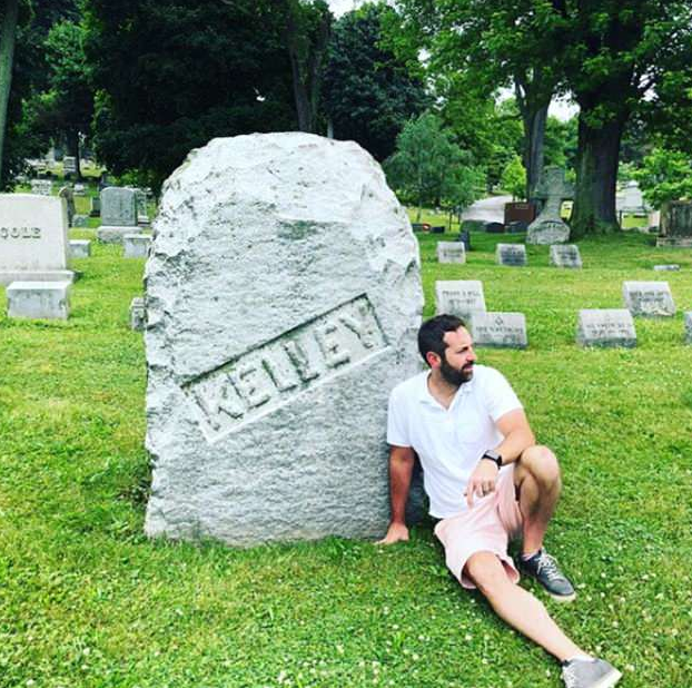 Heigl's husband, Josh Kelly, posing next to a gravestone with his last name. (Source: Instagram)