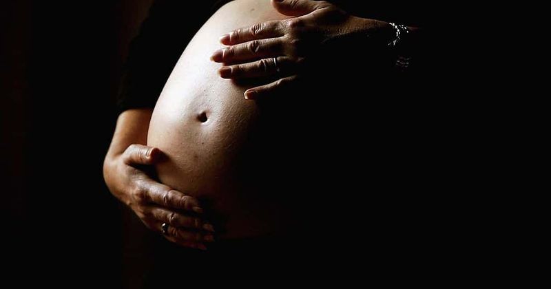 Man who chopped off his pregnant wife's arm before trying to swim to Canada has been arrested on attempted murder charges