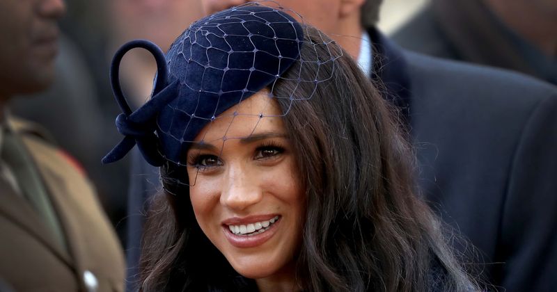 Meghan Markle mistakenly skips 'duchess slant' and crosses her legs at royal event