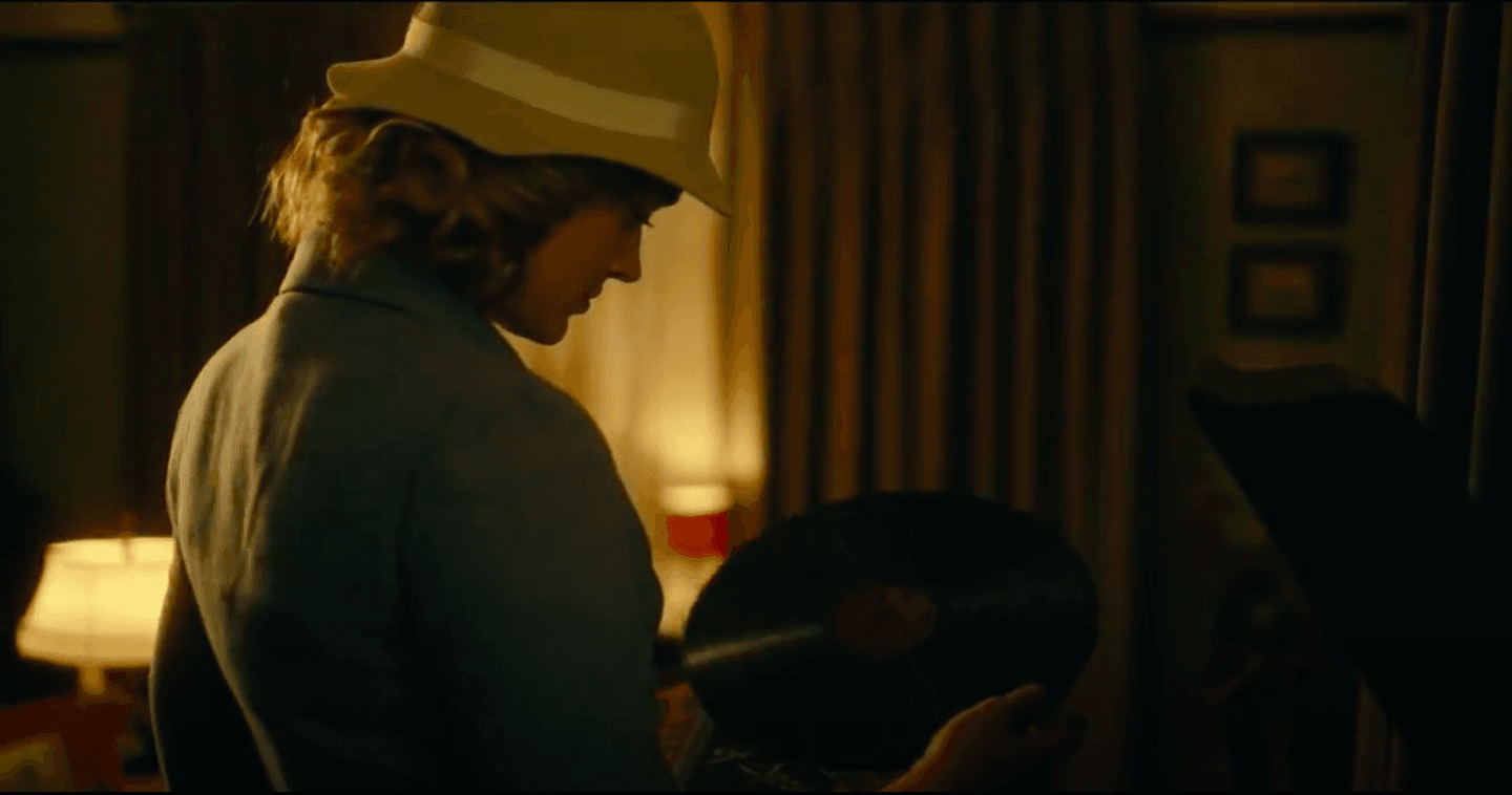 Susan unwraps the Stravinsky record that Ernest secretly gifts her. (Image Source: CBS All Access)