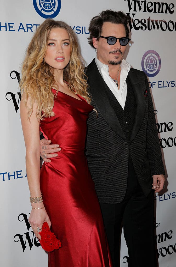 After his divorce from actress Amber Heard, Johnny pretty much sunk into a hole because of the battery and assault issues that the marriage had seemingly become riddled with. (Source: Getty Images)