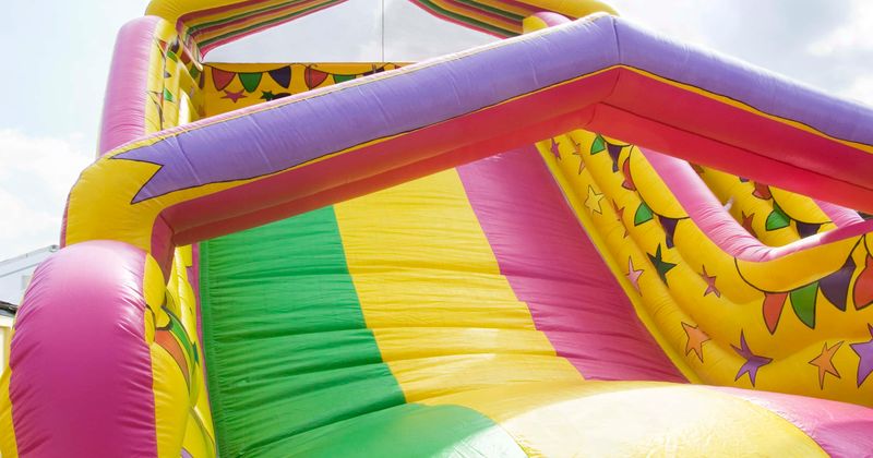 Child dies after being catapulted 20 feet in the air as bouncy castle explodes due to heatwave