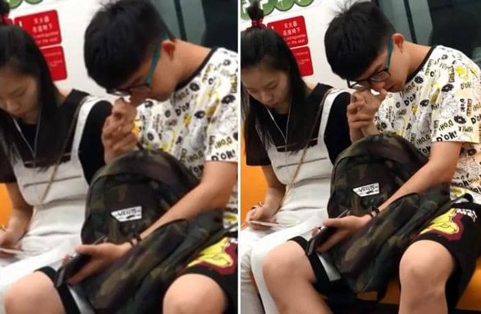 His other half seemed oblivious to the fact her digit was being used to explore his nostrils. (Screenshot)