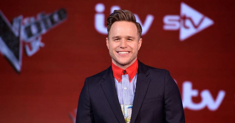 Olly Murs gets flirty with mystery brunette while partying in Ibiza