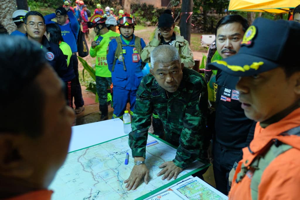 Thai officials plan over a map of Tham Luang Nang Non cave to find the way to approach the missing boys on June 28, 2018 in Chiang Rai, Thailand. (Getty Images)