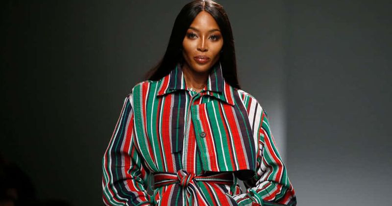 Naomi Campbell has nip slip as she arrives at fashion show but she handles it like pro