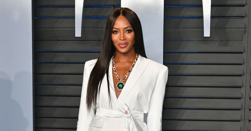 Naomi Campbell has nip slip as she arrives at fashion show but she handles it like pro