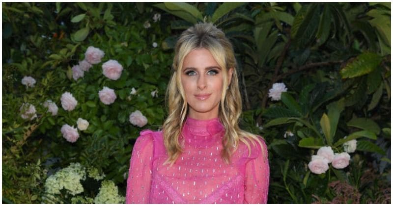 Nicky Hilton Rothchild looks stunning in a hot pink gown as she makes an appearance at the Valentino show