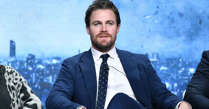 Arrow star Stephen Amell has us all aquiver as he strips for poolside snap