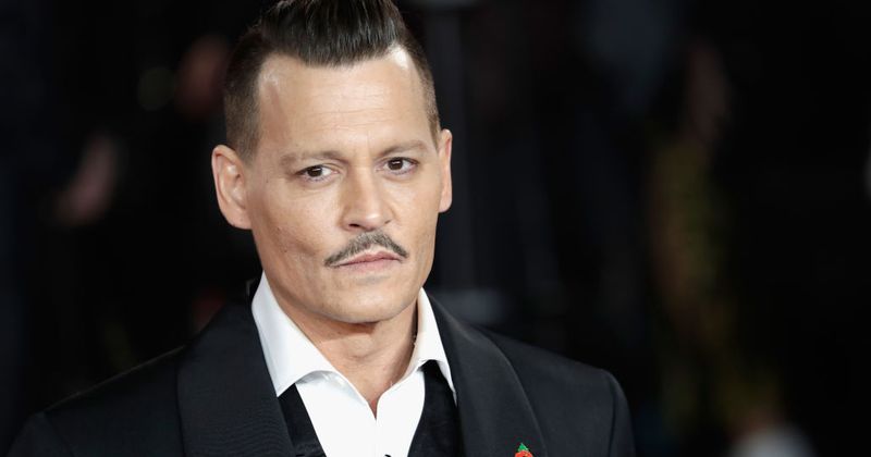 Another lawsuit! Johnny Depp sued by crew member who claims the actor punched him on a film set