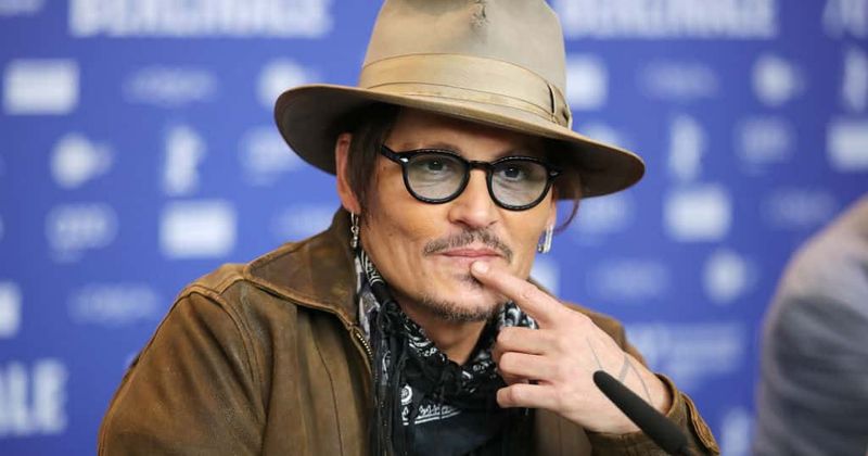 Another lawsuit! Johnny Depp sued by crew member who claims the actor punched him on a film set