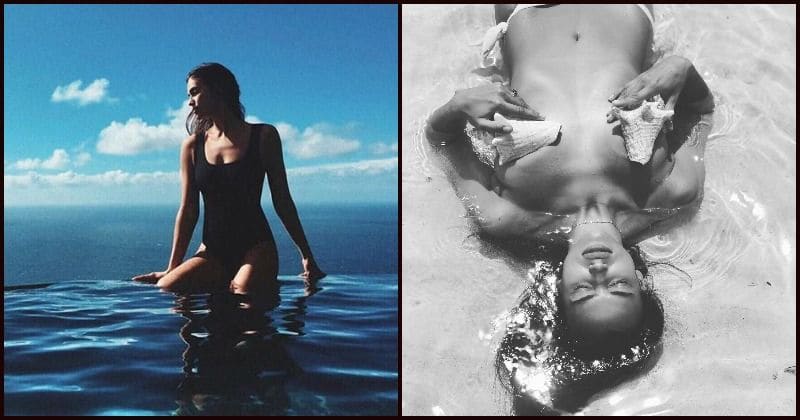 Irina Shayk sunbathes topless at beach as she covers her modesty with seashells