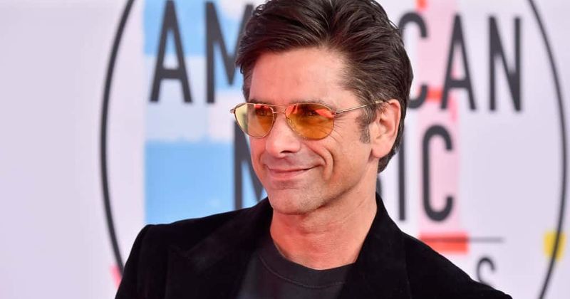 John Stamos reveals his "genius" diaper changing trick and it involves a 'little butt spatula'