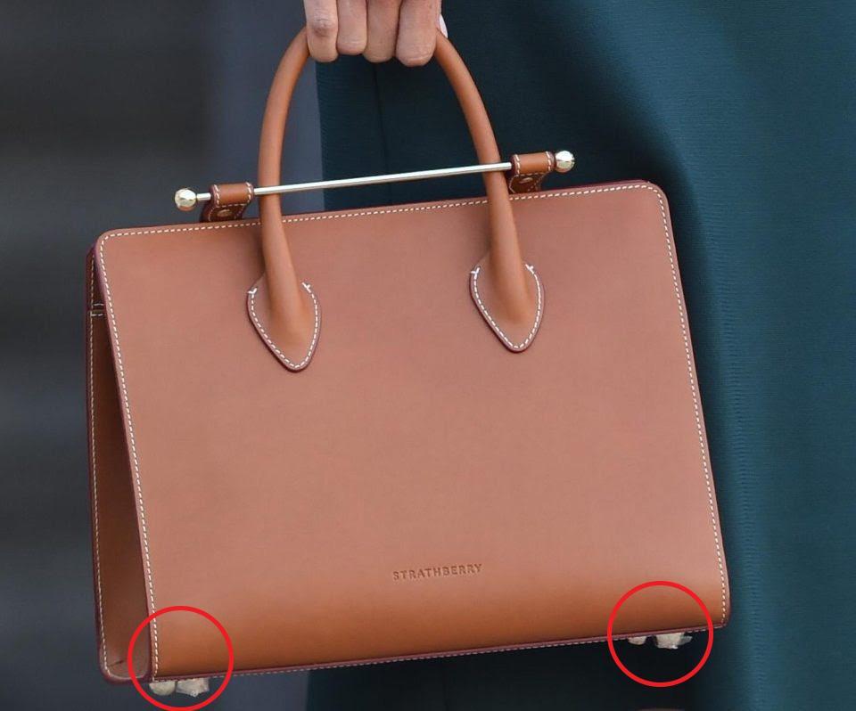 The Strathberry tote was fresh out of the box, with Meghan forgetting to remove the plastic from the bottom (Twitter)