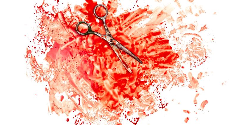 Homeless street artist who has no arms arrested for stabbing passerby with pair of scissors
