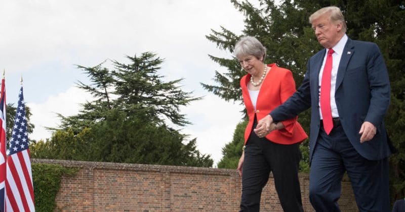 Donald Trump won't stop holding Theresa May's hand; is he trying to assert his authority?