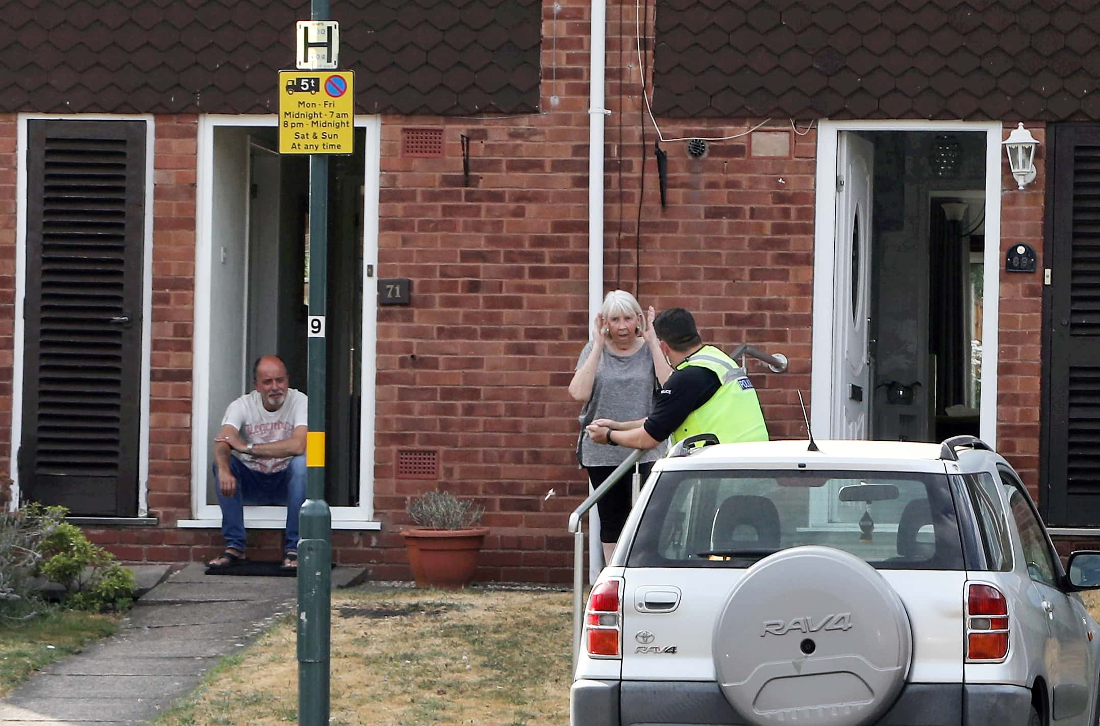 Neighbours told how they heard the mum screaming before seeing her cling to the vehicle and being dragged down the street (Image: SWNS)