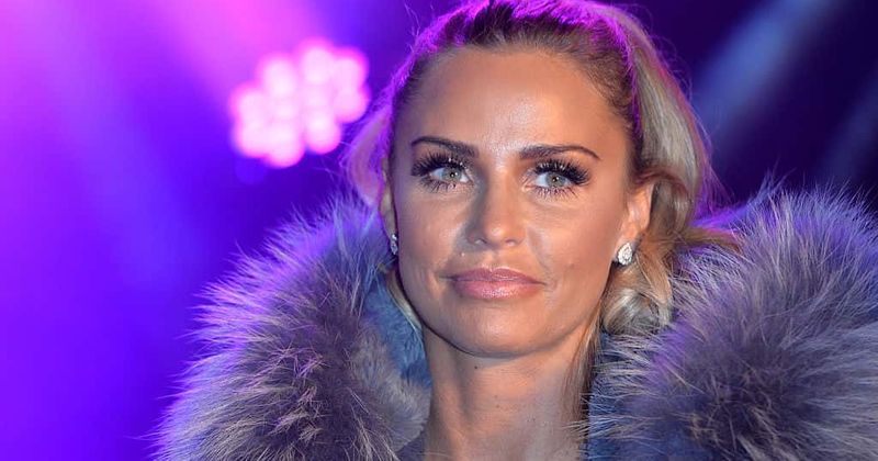 Boozy nights: Katie Price seen stumbling out of a club drunk as Peter Andre looks after the kids