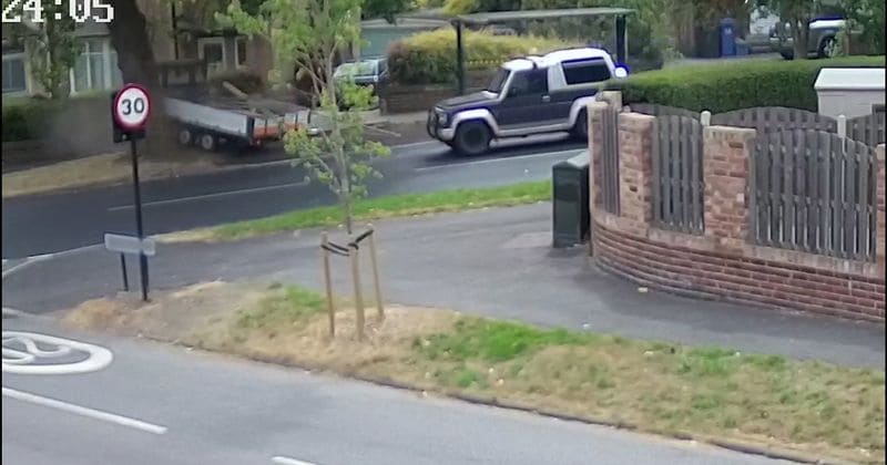 Runaway trailer speeds terrifyingly down a residential street and ploughs through bus stop and tree