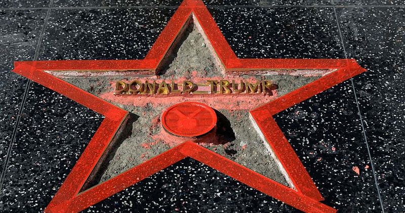 Brawl breaks out at Trump's Walk of Fame star in Hollywood after it was destroyed with a pickaxe