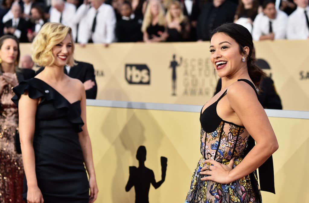 Actors Yael Grobglas (L) and Gina Rodriguez attend the 24th Annual Screen Actors Guild Awards at The Shrine Auditorium on January 21, 2018 in Los Angeles, California.