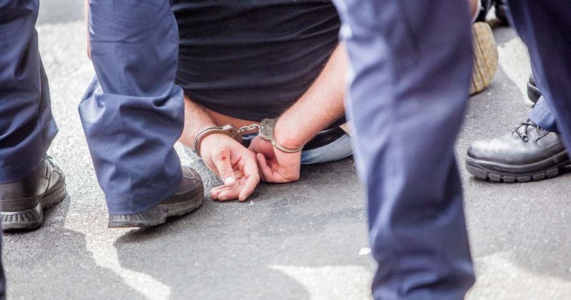 Police arrests teenage boys who 'covered disabled woman in flour and eggs' and posed for a shocking picture