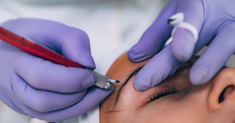 Woman scarred by botched eyebrow tattoo procedure gets offered free treatment by qualified technician