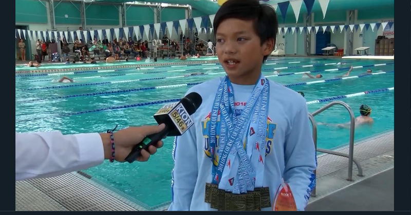 10-year-old "Superman" Clark Kent shatters swimming legend Michael Phelps' record