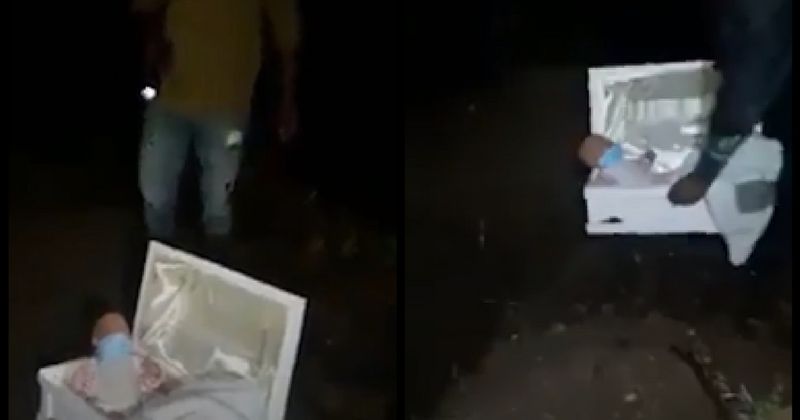 Grieving father digs up his dead baby's coffin only to find a plastic doll inside