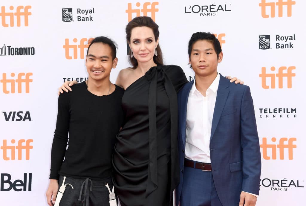 Maddox Jolie-Pitt, Angelina Jolie, and Pax Jolie-Pitt attend the World Premiere of Netflix's Film's 'First They Killed My Father' during the Toronto International Film Festival at Princess of Wales Theatre on September 11, 2017 in Toronto, Canada. (Photo by Emma McIntyre/Getty Images for Netflix)
