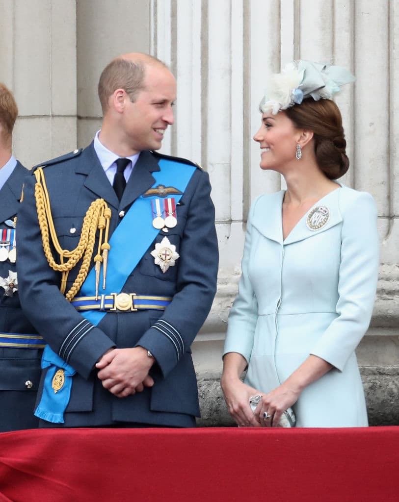 Prince William, Duke of Cambridge and Catherine, Duchess of Cambridge watch the RAF flypast on the balcony of Buckingham Palace, as members of the Royal Family attend events to mark the centenary of the RAF on July 10, 2018 in London, England. (Photo by Chris Jackson/Getty Images)