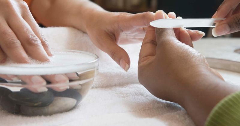 FAITH RESTORED Walmart employee steps in to give disabled woman a manicure after salon refused to do so
