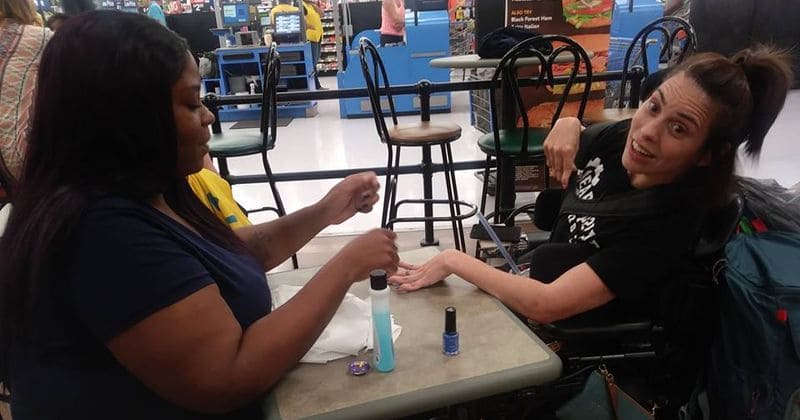 FAITH RESTORED Walmart employee steps in to give disabled woman a manicure after salon refused to do so